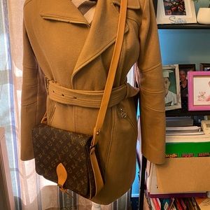 LV cartouchiere sling bag in used good condition